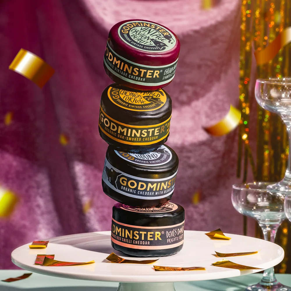 Stacked Godminster cheeses, photographed by Antoine Schroetter